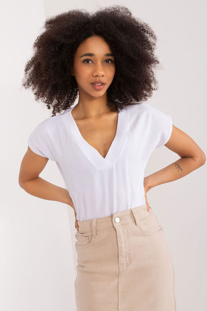 Elegant BFG blouse worn by model, capturing the simplicity and versatility ideal for everyday styling and meetings.
