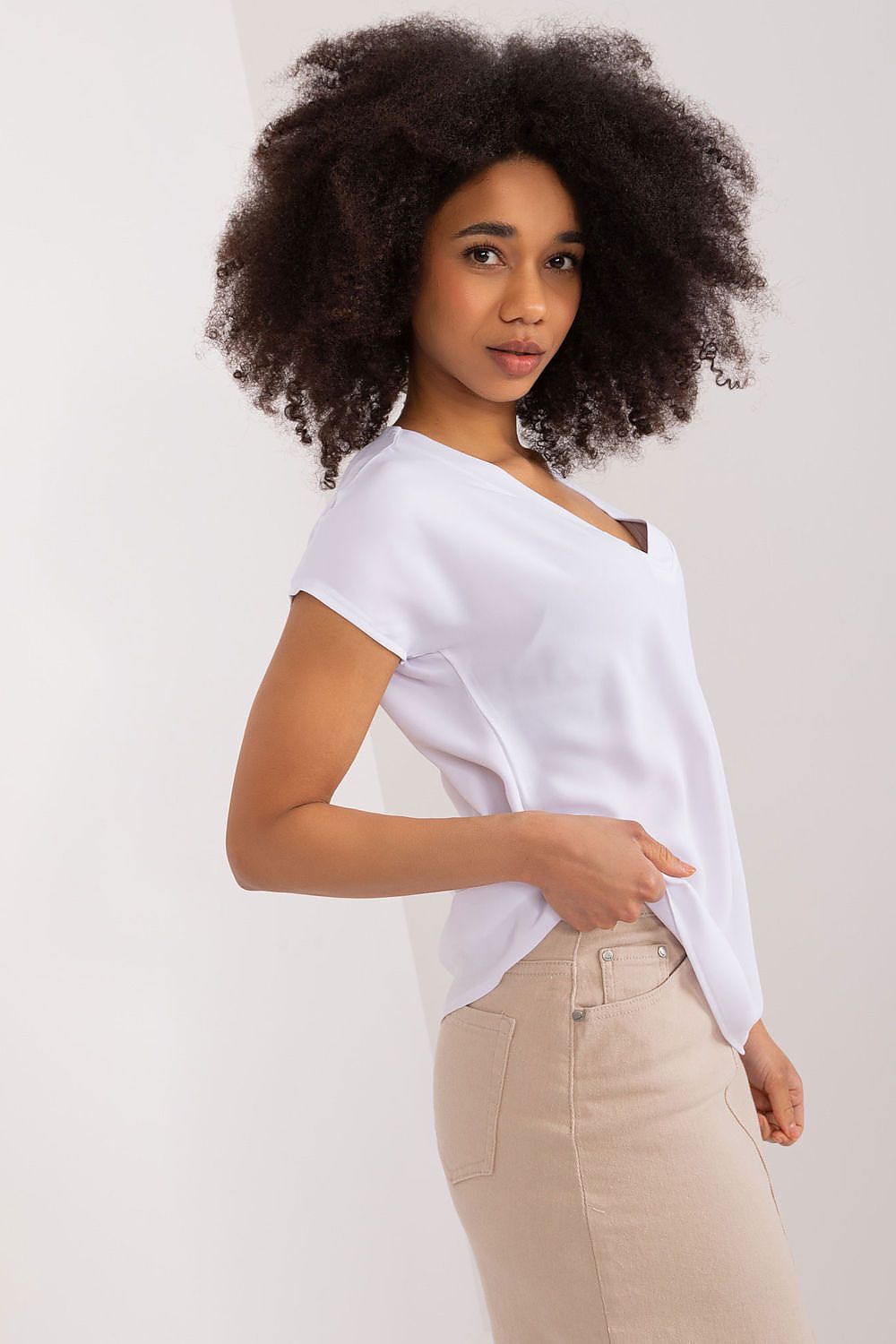 Stylish BFG short sleeve blouse in various sizes, demonstrating its comfortable fit and refined aesthetic for any occasion.