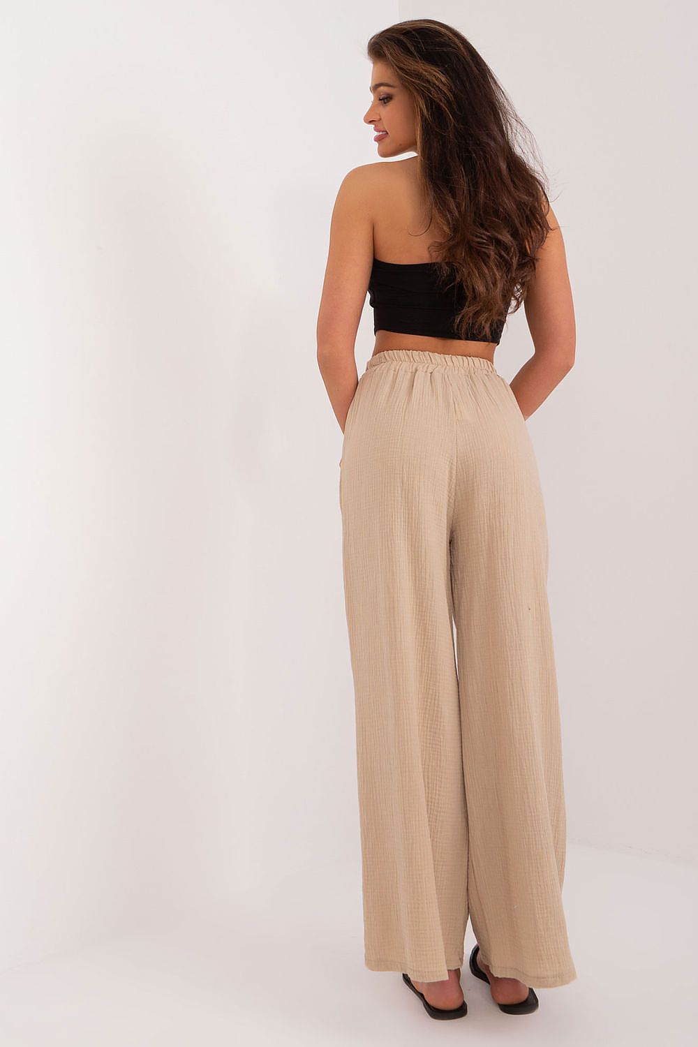 Luxurious high rise trousers for women by Italy Moda, crafted from smooth polyester for maximum comfort and a tailored silhouette.