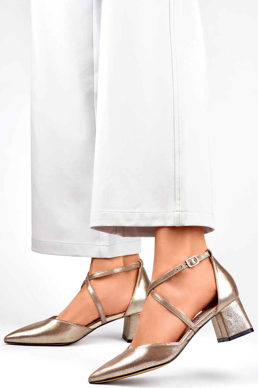 PRIMO's luxurious eco-friendly block heel pumps with 5.5 cm heel, designed for comfort and stability, ideal for any elegant occasion.