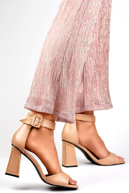 PRIMO luxurious 9cm heel sandals featuring a stylish buckle fastening, perfect for enhancing summer outfits with elegance and comfort.