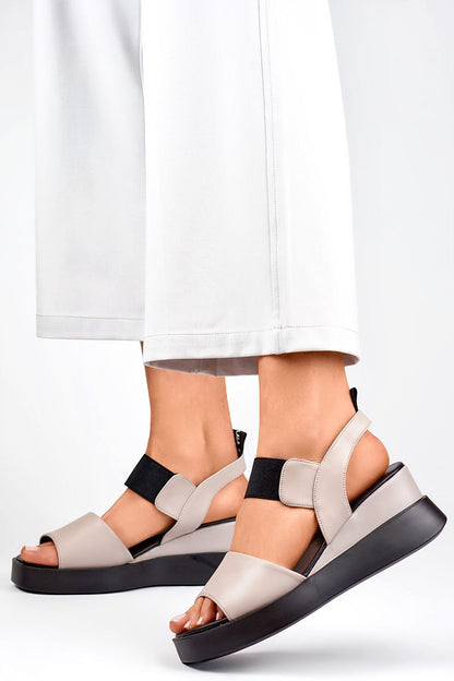 PRIMO elegant women's sandals made of natural leather with a stylish 6 cm heel, offering luxury and comfort for summer wear.