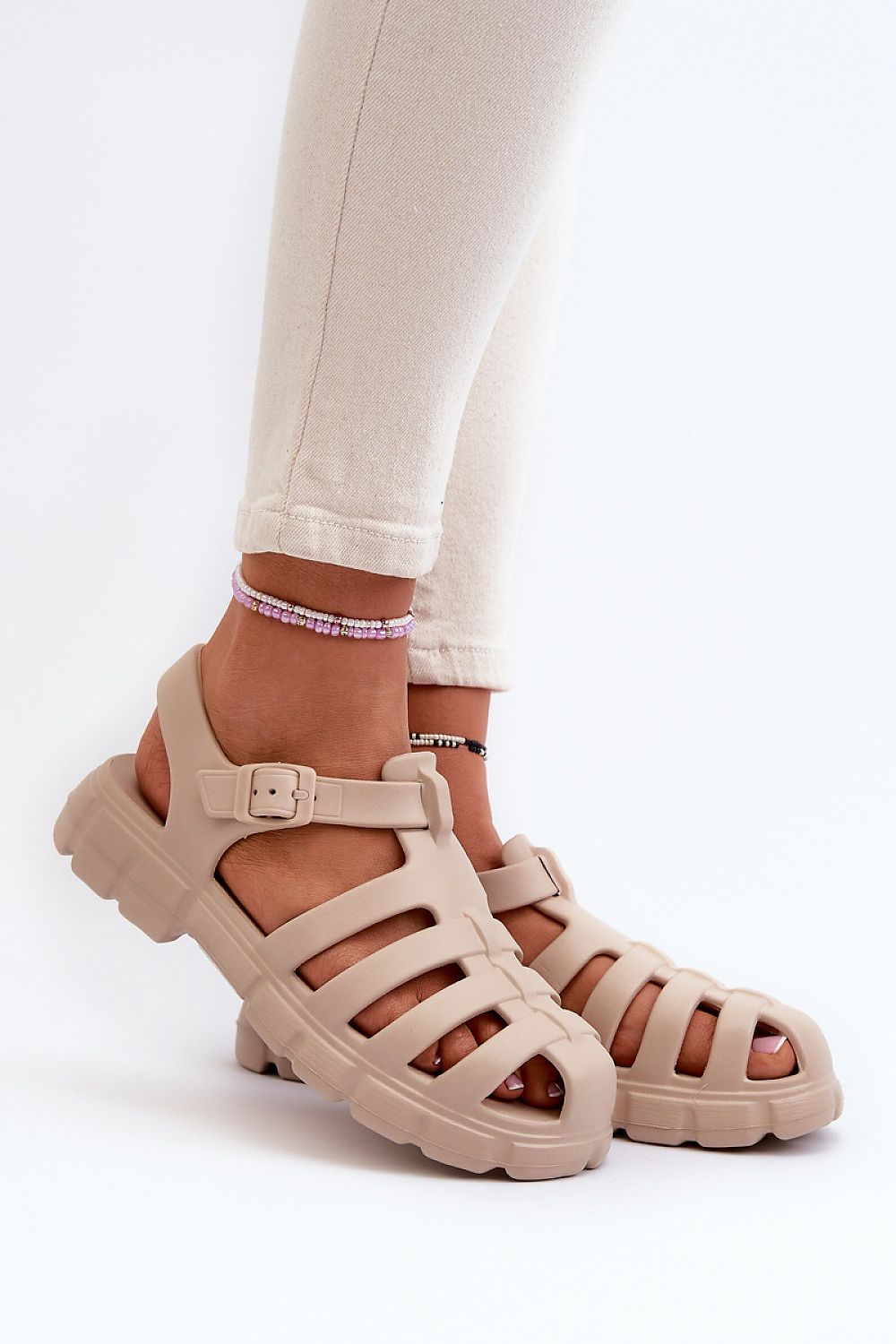 Elegant women's foam sandals designed for summer comfort by Step in Style, perfect for pool and beach outings with a soft and stylish design.