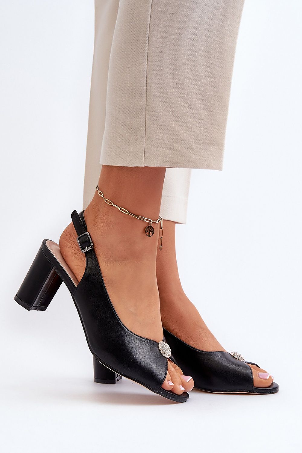 Elegant summer sandals by Step in Style, designed with an adjustable strap and 7cm heel, perfect for chic outdoor events.