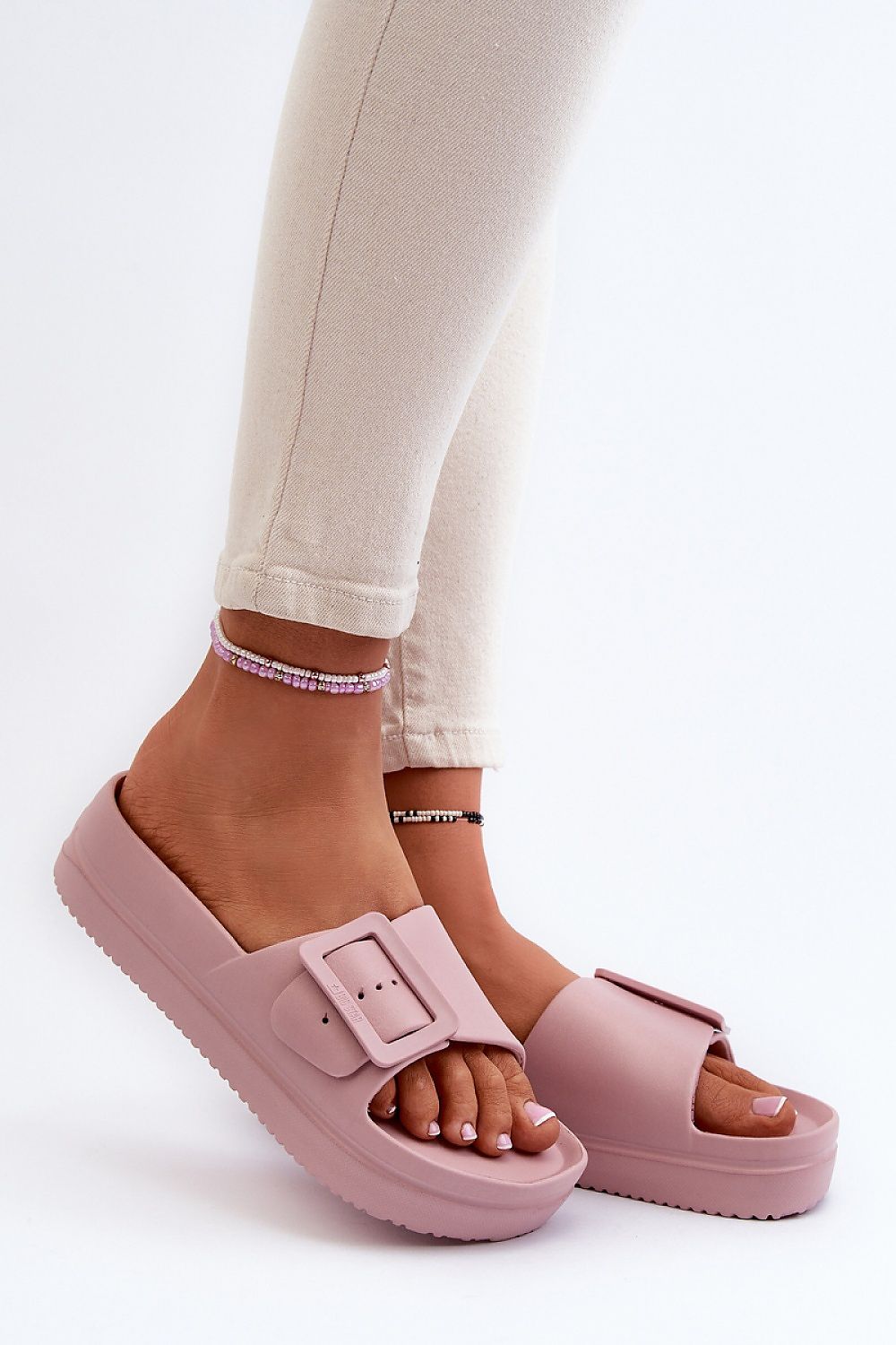 Fashionable Big Star Women's Platform Flip-Flops with a modern buckle strap, combining elegance and lightweight foam for chic summer occasions.