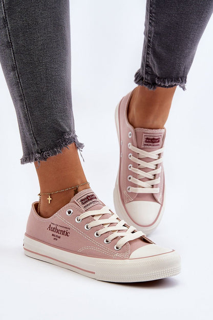 Step in Style women's sneakers in a serene outdoor setting, displaying chic design and all-day comfort for warmer days.