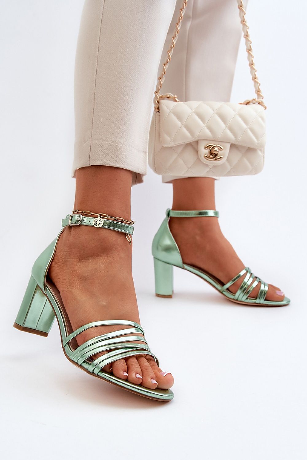 Elegant women's eco leather heel sandals by Step in Style featuring charming intertwining straps and a sturdy 6.5cm block heel, perfect for summer outfits.