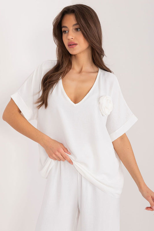 Luxury oversized V-neck blouse by Italy Moda, crafted from a comfortable polyester blend for everyday elegance. Ideal for various occasions, showcasing a casual aesthetic with short sleeves and a flattering loose fit.