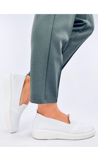 Stylish Women's Inello Slip-On Tennis Shoes made from breathable material, offering a luxurious feel and a graceful silhouette for modern women.