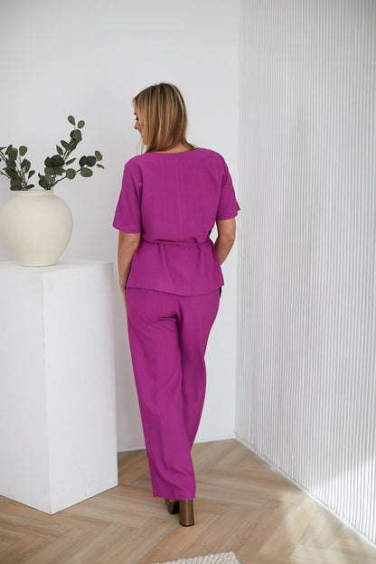 Elegant La Aurora spring-summer set for women, featuring a stylish blouse and pants in premium natural fabric.