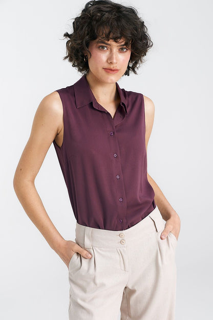Luxury sleeveless viscose shirt for women by Nife, highlighting elegant details and a timeless silhouette, perfect for both casual and formal occasions.