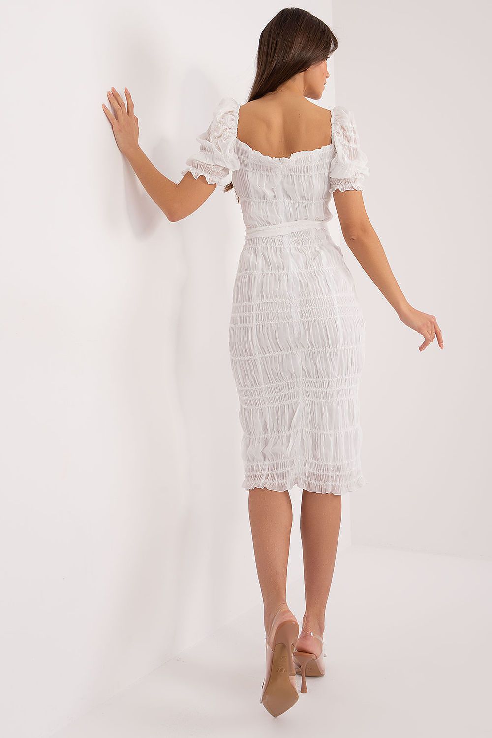 Detail shot of the puffed short sleeves and ruffled accents on the Lakerta elegant midi pencil dress, highlighting its feminine charm and exquisite design.