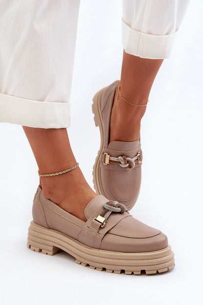 Close-up of luxurious natural leather moccasin slippers with flat heel and shiny loop from Step in Style, ideal for sophisticated casual wear.