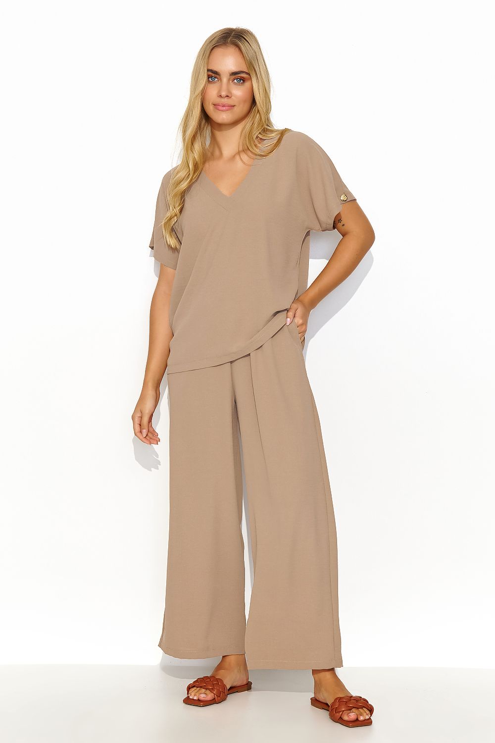 Chic cappuccino colour version of Makadamia's Elegant Women's 2-Piece Set, consisting of a V-neck blouse and flowing wide-leg trousers.