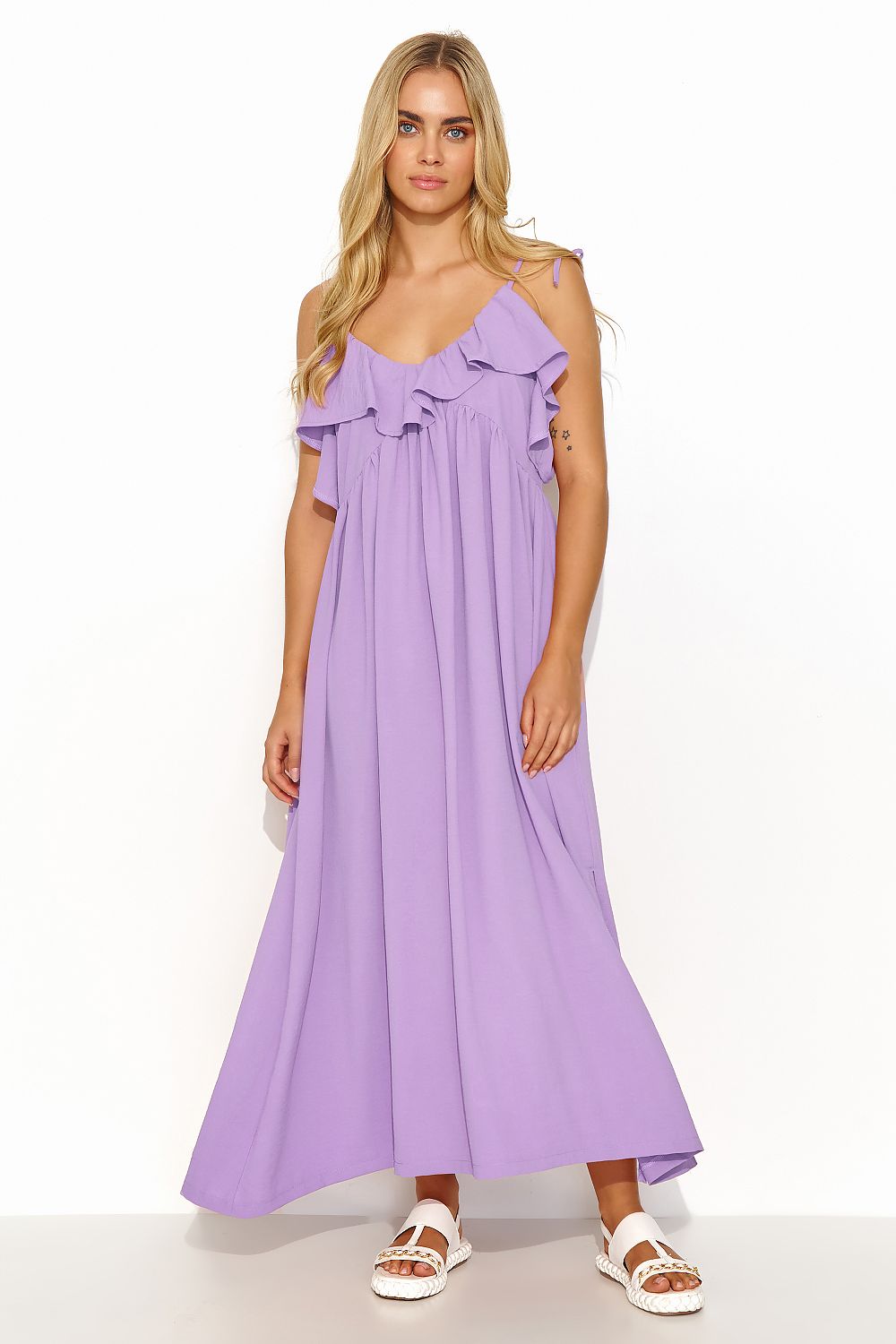 Elegant oversize long dress with ruffle neckline and subtle sparkle by Makadamia, perfect for warm spring and summer occasions, showcasing a stylish blend of comfort and chic sophistication.