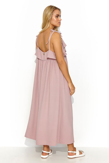 Makadamia's stunning long oversize dress with flowing fabric and stylish bling details, perfect for chic casual outings.