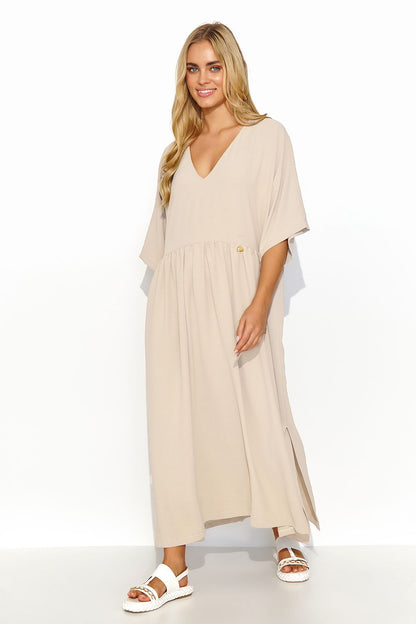 Elegant oversize long dress by Makadamia featuring a deep V-neckline and stylish back tie, perfect for summer occasions and romantic dates.