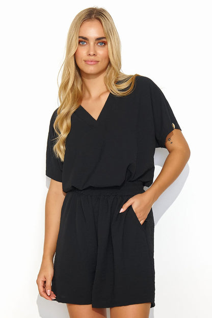Makadamia Women's Casual Set featuring an elegant blouse with heart neckline and comfortable shorts in luxurious black fabric.
