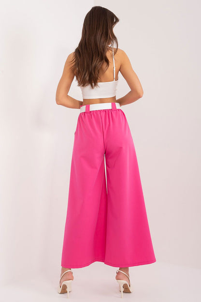 Elegant women's high waist palazzo trousers with pockets, designed by Italy Moda, showcasing a smooth polyester fabric that combines comfort and sophistication.