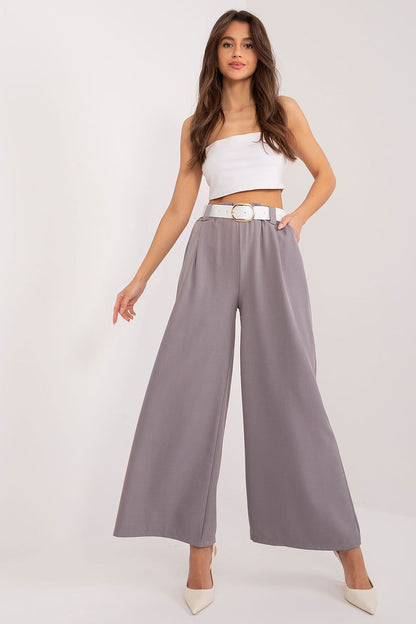 Sophisticated women's high waist palazzo trousers with pockets, crafted by Italy Moda for luxurious comfort and style.