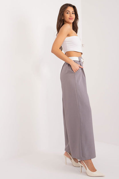 Elegant wide-leg palazzo pants showcasing chic design and practical pockets, designed by Italy Moda for effortless sophistication.