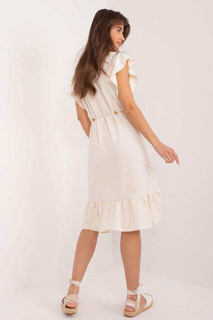 Italy Moda's flared daydress in smooth polyester, highlighting a unique asymmetrical style and delicate ruffle sleeves perfect for warm summer occasions.