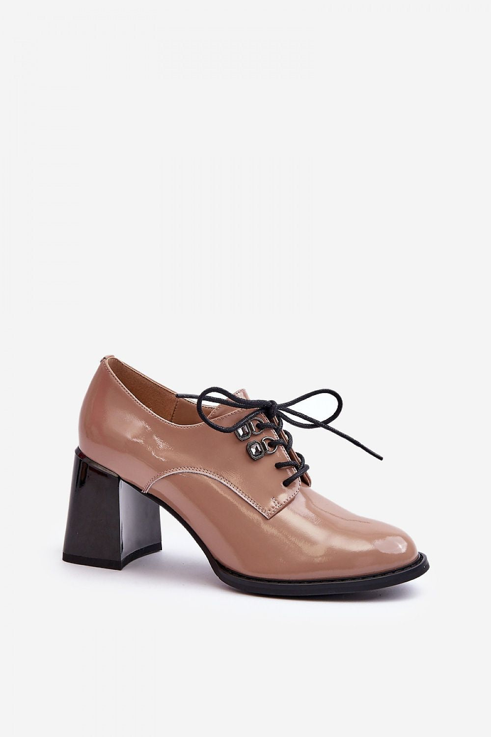 Stylish low heeled half shoes by Step in Style, crafted from premium natural leather, offering elegance and stability, suitable for versatile styling and comfortable wear.