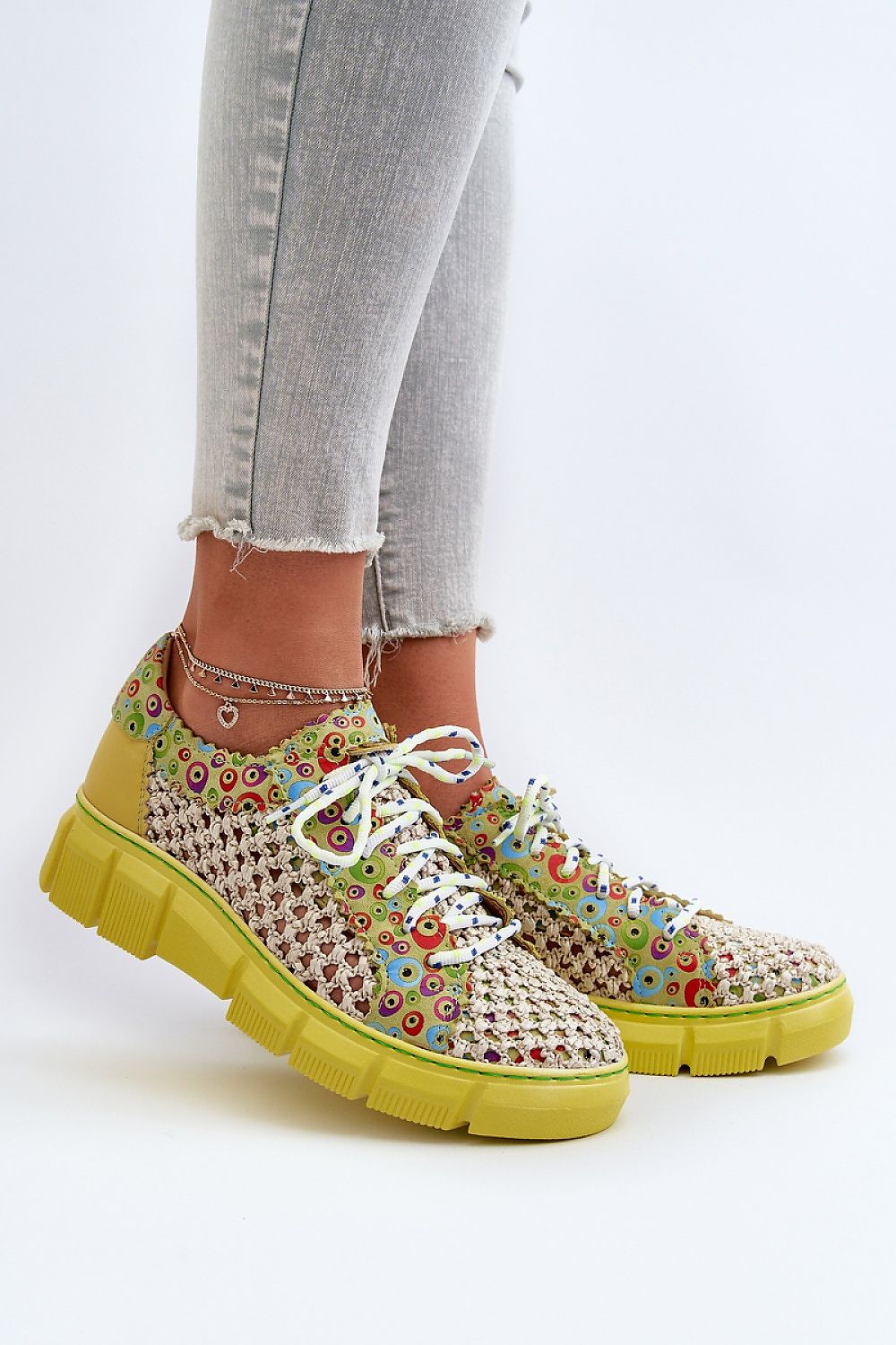 Stylish women's half shoes in vibrant multicolours with a unique woven design from Step in Style, perfect for a luxurious yet comfortable look.