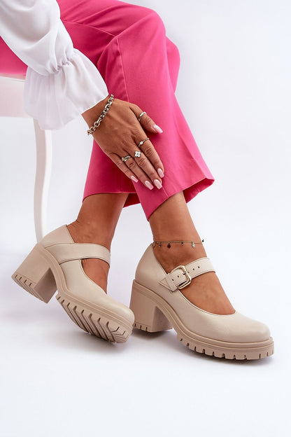 Elegant natural leather heel pumps by Step in Style, featuring an adjustable strap and a chic 7.5cm heel height, styled with vibrant pink trousers for a luxury spring look.