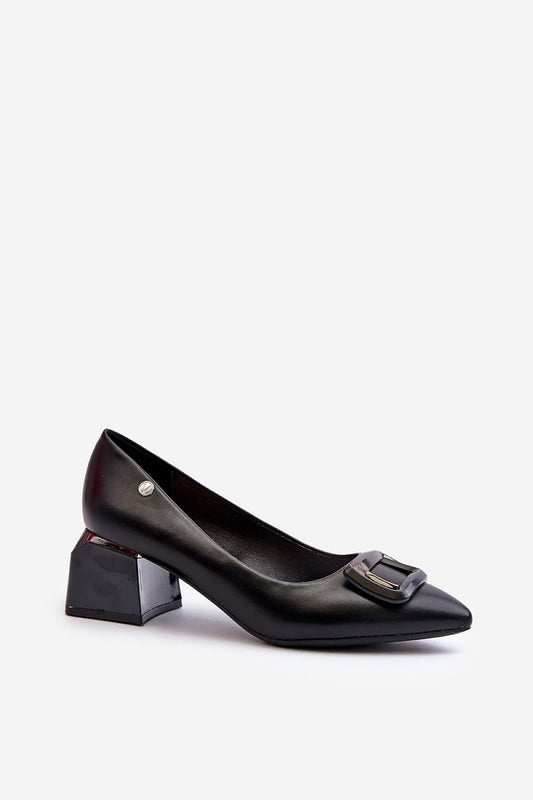 Side view of Vinceza block heel pumps in refined black eco leather, featuring a chic pointed toe and elegant buckle ornament, ideal for formal occasions.
