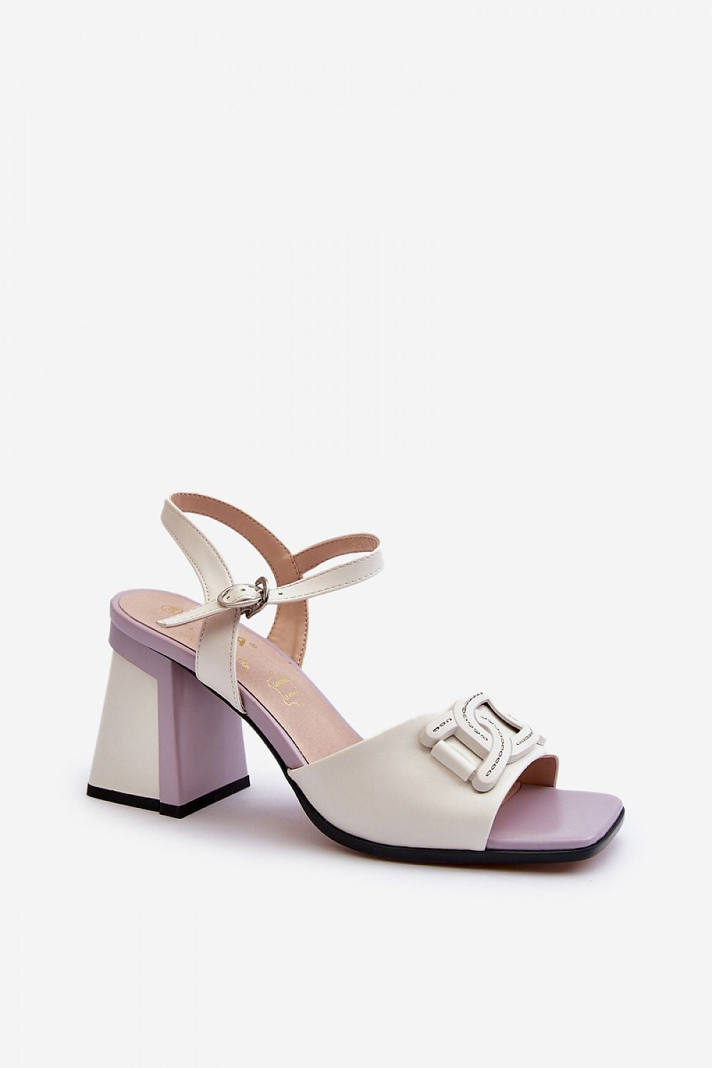 Sophisticated eco leather heel sandals by Step in Style, showcasing a unique decorative front ornament and block heel design against a minimalistic backdrop.
