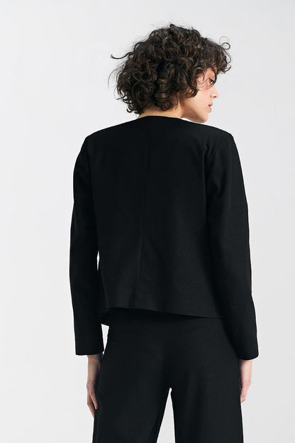 Back view of Nife's stylish black boxy jacket, highlighting its modern design with clean lines and classic style, ideal for layering.