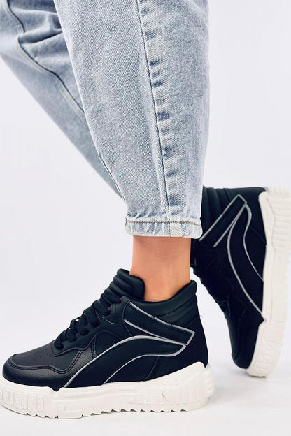 Close-up view of Inello women's black ankle sneakers, showcasing the sleek eco leather upper and modern design, ideal for casual and sporty outfits.