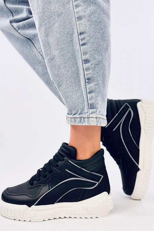 Close-up view of Inello women's black ankle sneakers, showcasing the sleek eco leather upper and modern design, ideal for casual and sporty outfits.