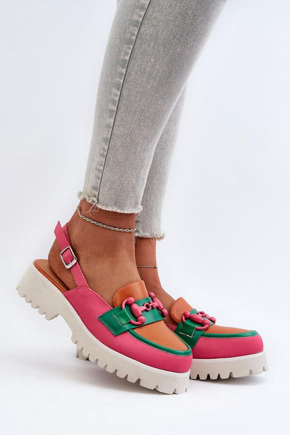 Vibrant luxury eco leather heel sandals by Step in Style, presenting a trendy combination of green, orange, and pink, ideal for a bold summer look, styled with fashionable denim.