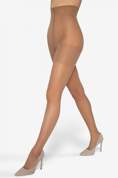 Gatta High Rise Tights with LYCRA Xceptionelle elegantly showcased, highlighting their smooth finish and luxurious fit on a model wearing stylish heels.