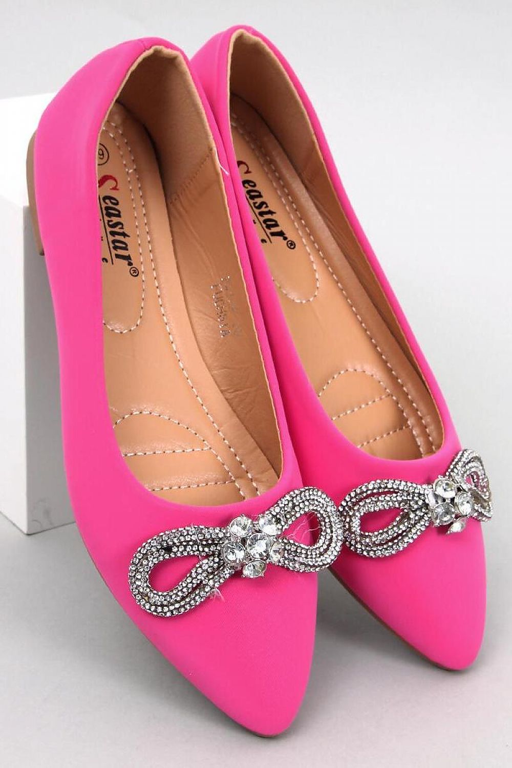 Exquisite pink Inello ballerina flats featuring a sparkling zircon bow, crafted from matte ecological leather for elegance and comfort.