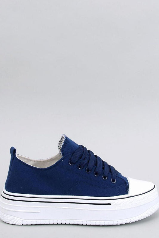 Elegant navy blue platform sneakers by Inello, showcasing a trendy high sole design and classic white toe cap, perfect for a stylish elevation in casual fashion.