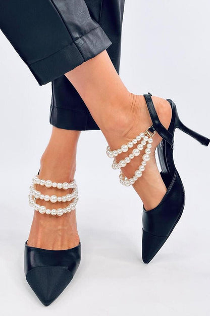 Chic black high heels by Inello, featuring multiple strands of pearls and a sleek open heel, perfect for formal occasions.