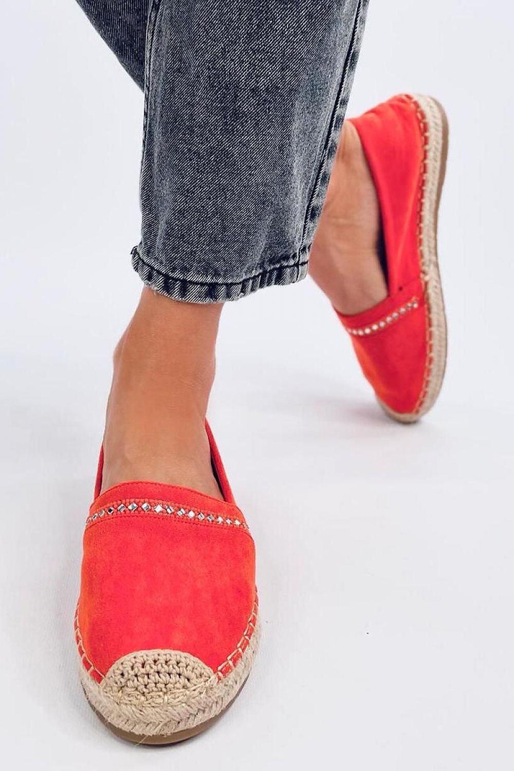 Chic women's orange suede espadrilles with decorative stone accents by Inello, perfect for adding a touch of luxury to casual summer looks.