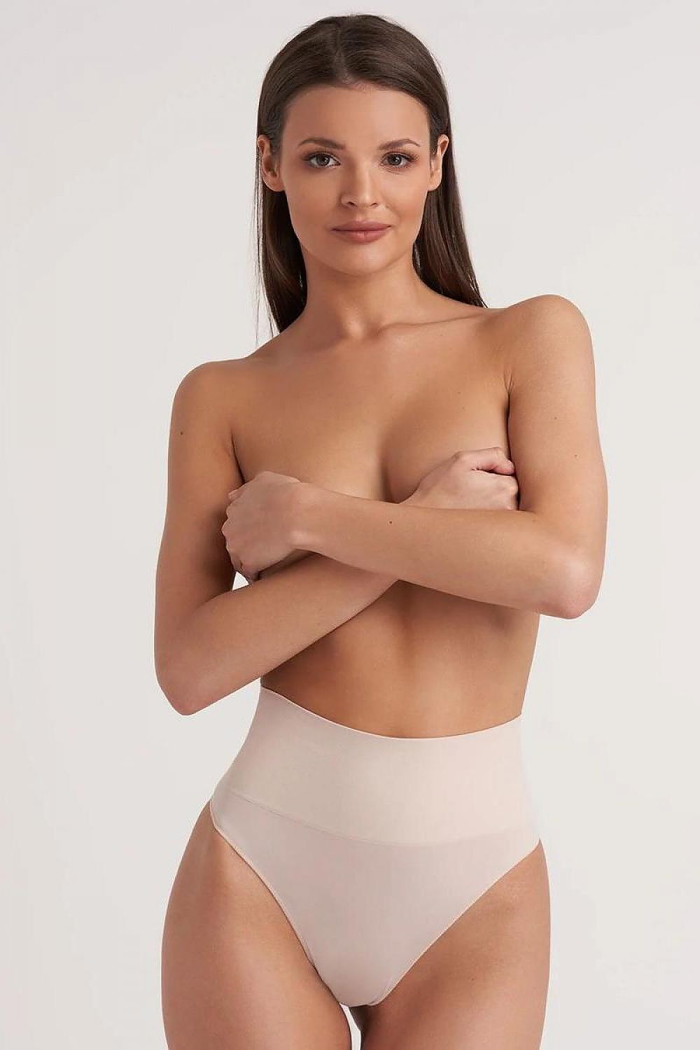 Luxurious Gatta seamless high-waist thong panties in nude, designed for ultimate comfort and body-shaping effect, model showcasing front view.