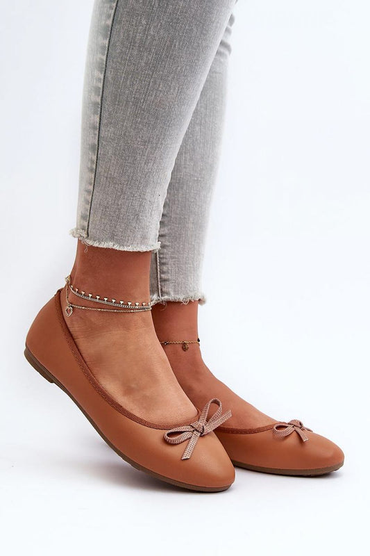 Elegant women's eco leather ballerinas with charming bow detail, showcased in a stylish setting by Step in Style, perfect for all-day comfort and versatile wear.