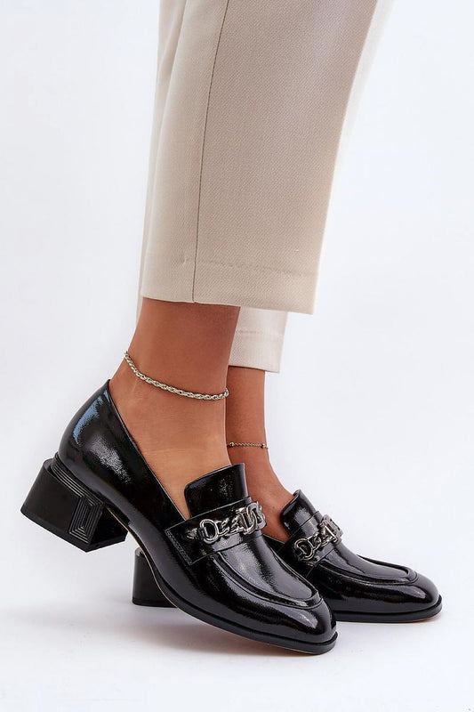 Elegant women's block heeled pumps by Step in style featuring a glossy black finish and embellished with a modern chain detail, ideal for sophisticated occasions.