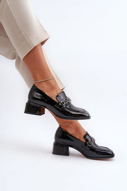 Luxurious black heeled pumps by Step in style with a refined chain accent, designed for comfort and style in both formal and casual settings.