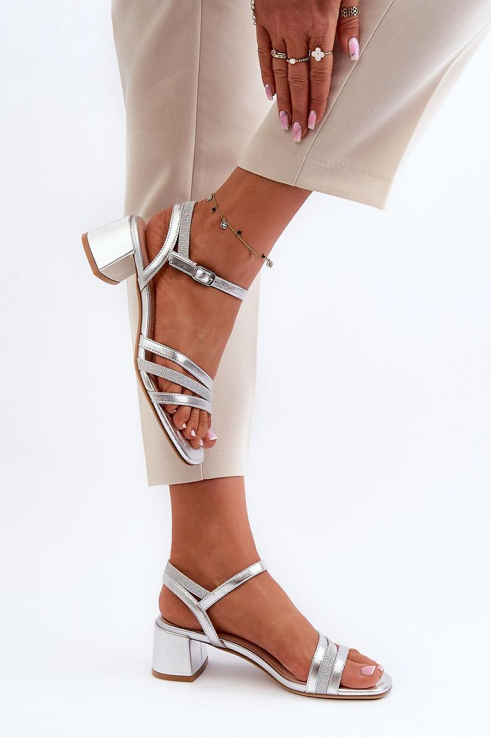 Chic women's eco leather heel sandals by Step in Style, showcasing a striking silver design with adjustable straps and a 5cm block heel, ideal for sophisticated occasions.