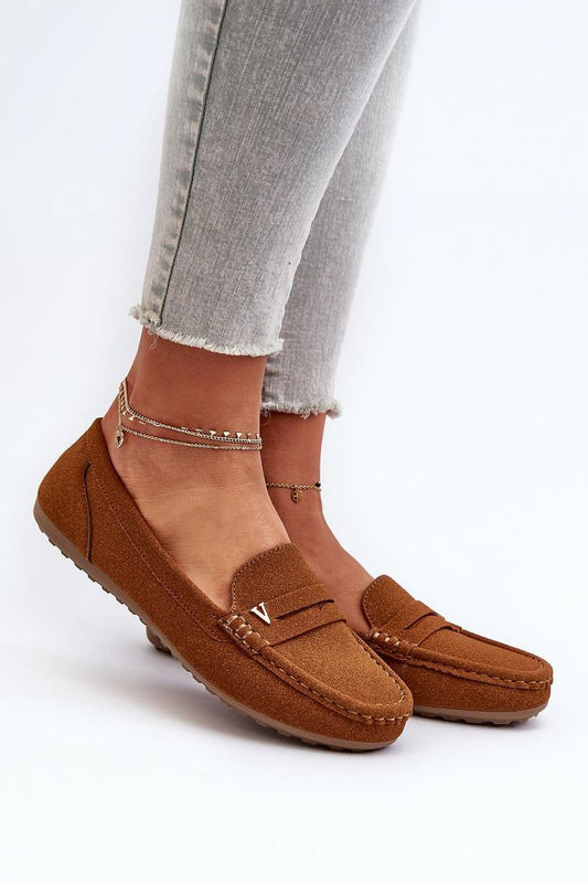 Luxury women's moccasins in imitation leather suede, featuring a soft molded insole, worn with stylish grey jeans. Elegant and comfortable footwear by Step in Style.