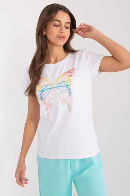 Stunning white BFG casual cotton blouse with a butterfly print, model showcasing a relaxed yet elegant pose, perfect for summer gatherings.