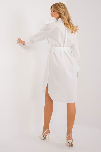 Back view of the Lakerta white cotton daydress, highlighting its stylish ruffled feature and comfortable fit, ideal for luxury fashion enthusiasts.