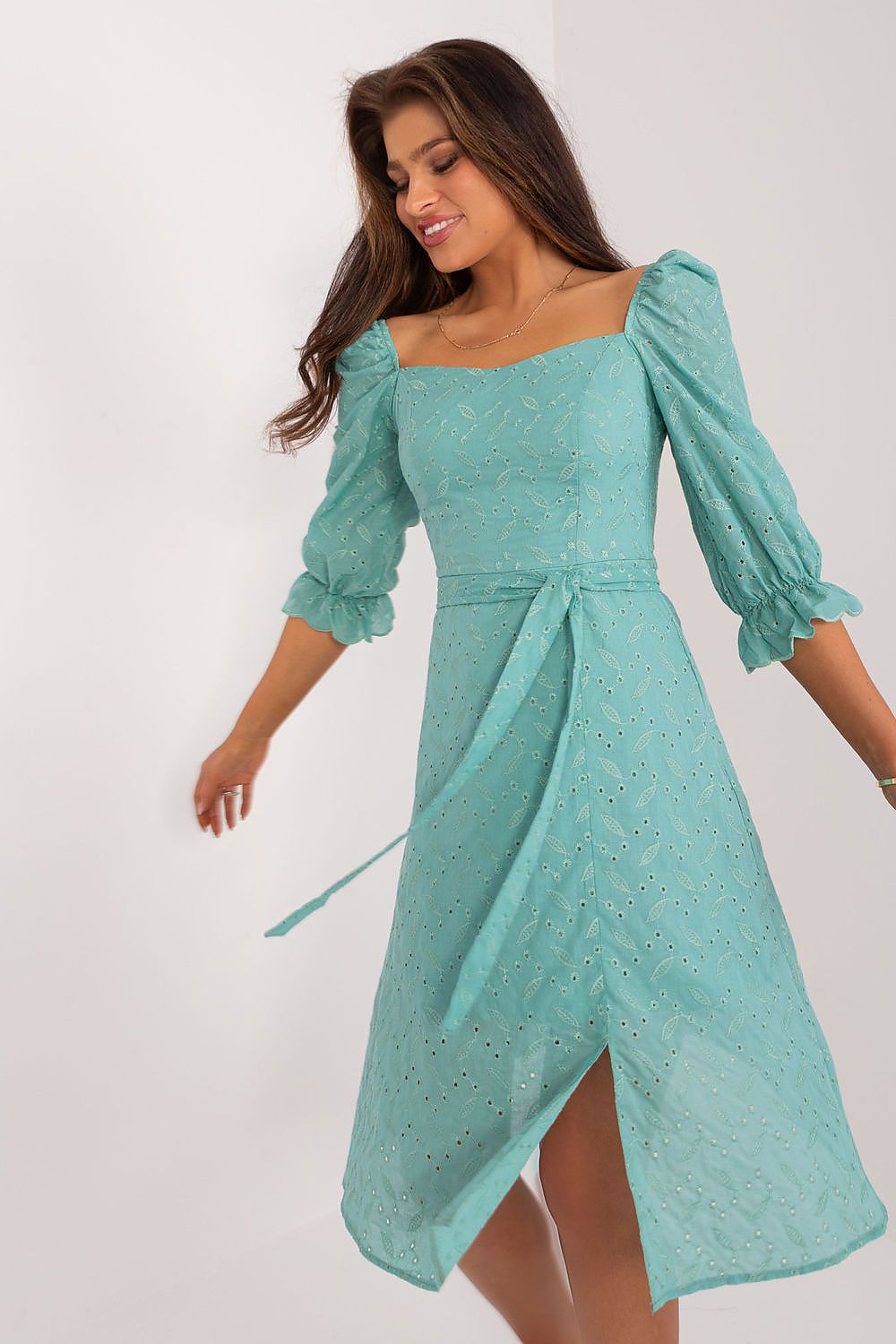 Stunning turquoise midi summer dress with puff sleeves and tie belt by Lakerta, elegantly designed with a flared cut for a light and airy feel.