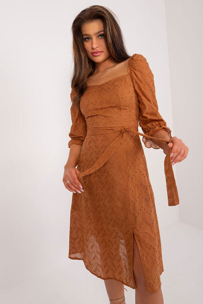 Chic brown midi summer dress by Lakerta, designed with puff sleeves and a tie belt, detailed with light embroidery, offering a sophisticated summer look.